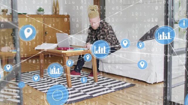 Animation of network of connections with icons and binary coding over albino man using laptop
