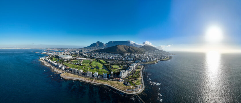 Panoramic aerial view of Cape Town and Table Mountain in sunlight