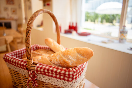 Lot of croissant is fresh and hot in a cafe next to other types of pastries. A variety of fresh pastries in the bakery window. The interior of an Italian restaurant.