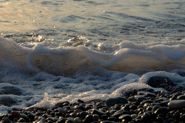 Obraz premium Spalshes of water and sea foam, sea waves, sea foam and water splashes. Abstract background