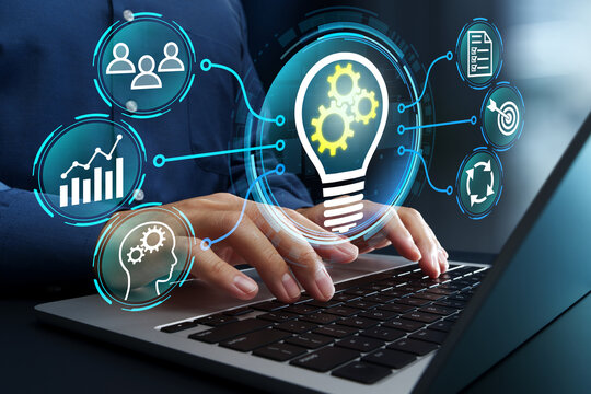 Innovation management strategy. Idea evaluation and organizational learning in research and development. Man managing experiment portfolio on laptop computer.