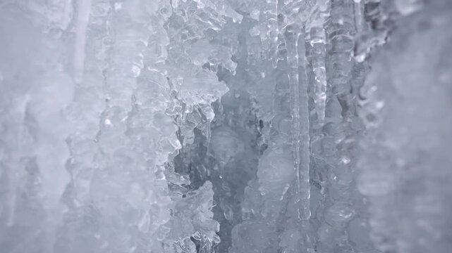 In the cold winter, the river freezes and the long ice hangs dripping with water