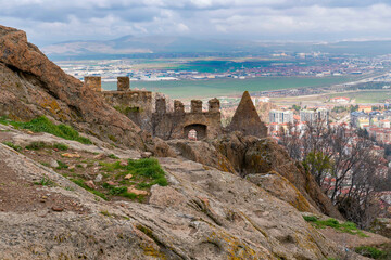 Fototapeta premium Historic fortress ruins and scenic urban landscape in Anatolia, Turkey at Afyonkarahisar.