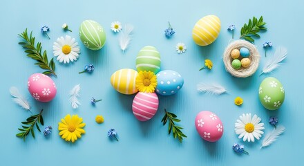Festive composition of colorful Easter eggs, spring flowers, and feathers artfully arranged on a light blue background, symbolizing joy and renewal