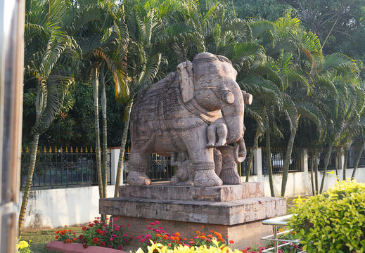 Detailed view of a historic stone elephant statue located outside the Konark Sun Temple in Odisha, India. This ancient sculpture represents strength, protection, and the excellence of Kalinga architec