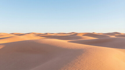 Minimal desert sand dunes with clear sky and warm natural light