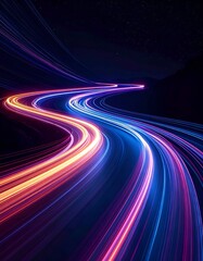 Winding road with glowing light trails at night