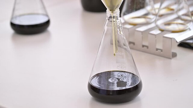 Scientist working with equipment in herbal science lab.Medical cannabis CBD oil extraction in laboratory. CBD hemp oil, medical cannabis sativa extraction.