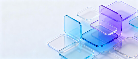 Transparent blue and purple glass blocks arranged in a layered, geometric pattern on a light background
