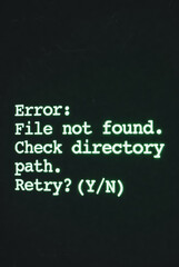 Green Retro Computer Screen Displaying "Error: File not found." Vintage old monitor terminal interface aesthetic, digital system failure, coding issues, data hacking, and 80s technology background.