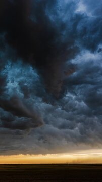 Moody sky filled with shifting storm clouds creating deep layered cloud movement