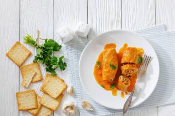 Stuffed cabbage rolls with quinoa and tomato sauce