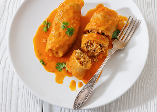 Stuffed cabbage rolls with quinoa and tomato sauce