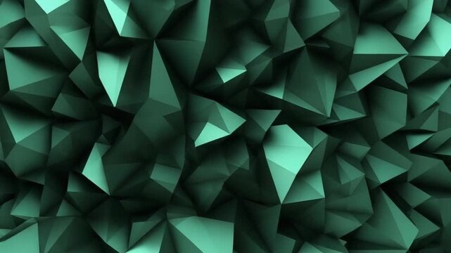 Abstract green geometric pattern with triangular shapes and polygonal forms in various shades of green