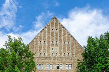 Historic Landgericht Berlin Court Building at Tegeler Weg with Neo Romanesque Stone Facade Triangular Gable and Prussian Eagle Emblem in Charlottenburg Germany