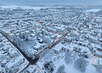 Aerial photo of a snowy area with residential buldings in the city of Kornwestheim in Baden-Wuerttemberg, Germany
