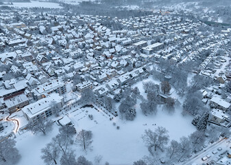 Aerial photo of a snowy area with residential buldings in the city of Kornwestheim in Baden-Wuerttemberg, Germany
