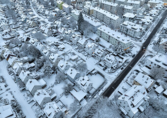 Aerial photo of a snowy area with residential buldings in the city of Kornwestheim in Baden-Wuerttemberg, Germany
