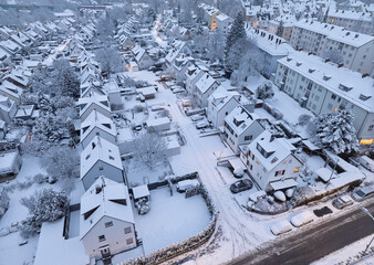 Aerial photo of a snowy area with residential buldings in the city of Kornwestheim in Baden-Wuerttemberg, Germany
