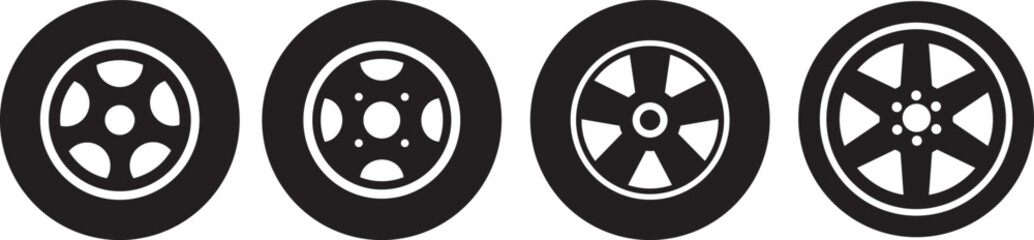 Obraz premium Wheel designs in Black and white: A collection of four distinct wheel designs, rendered in striking monochrome, showcasing the diverse aesthetics and structural elements of automotive wheels.