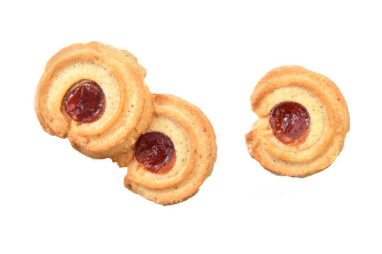 Butter cookies with jam closed up view above isolated on white