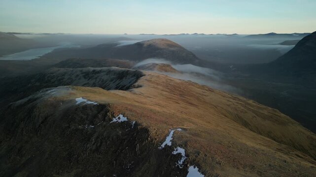 Glen Coe and Rannoch Moor, Scottish Highlands - aerial over the mountains in winter