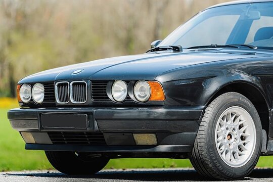 BMW E34 5 Series classic black sedan showing styling