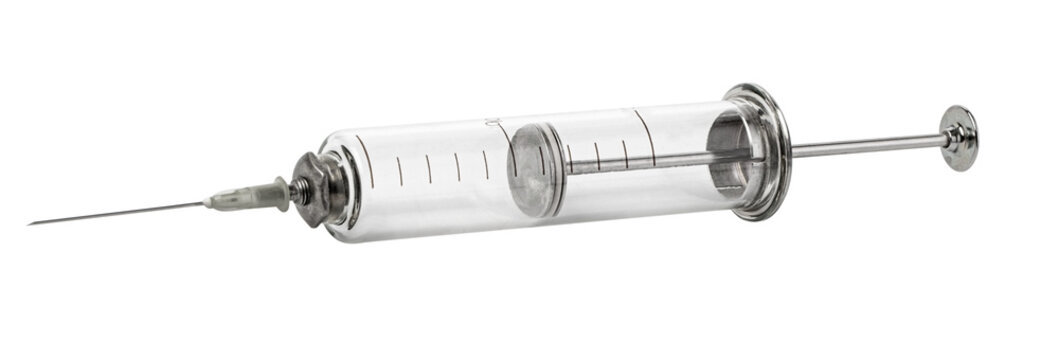 Vintage glass syringe showing antique medical tool for healthcare history