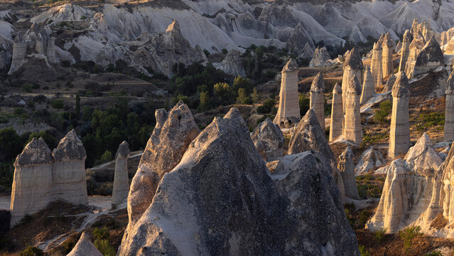 Cappadocia, a semi-arid region in central T&uuml;rkiye, is known for its long, cone-shaped rock formations concentrated in areas such as the Valley of the Monks, G&ouml;reme, and elsewhere.