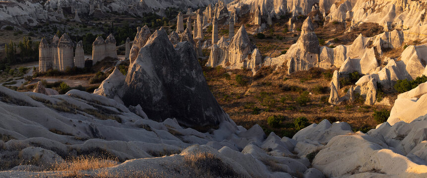 Cappadocia, a semi-arid region in central T&uuml;rkiye, is known for its long, cone-shaped rock formations concentrated in areas such as the Valley of the Monks, G&ouml;reme, and elsewhere.