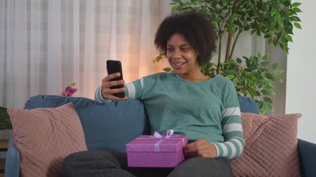 African-American woman celebrating her birthday on a video call