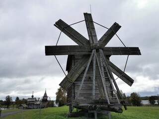 Kizhi Island. A view of the wooden mill and the ancient religious architecture