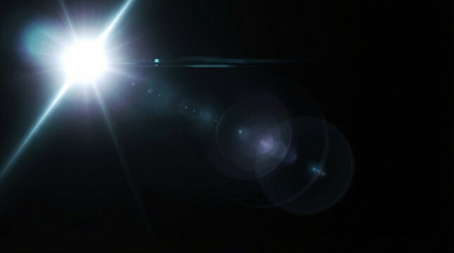 Bright cinematic lens flare effect shining diagonally on a black background with copy space for overlay graphics and digital design concept.
