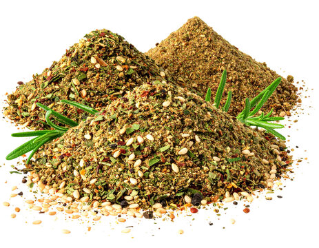 Three zaatar spice blend heaps scattering with sesame seeds and herbs, isolated on a transparent background, PNG

