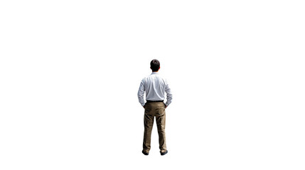 Man Contemplating: A man stands, hands in pockets, looking toward a bright future. Reflection, peace, and quiet confidence. 