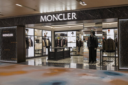 Changi, Singapore &ndash; Jan 6, 2026: Exterior view of a Moncler boutique at Changi Airport showing luxury fashion brand showcases premium outerwear and accessories inside its airport retail store.
