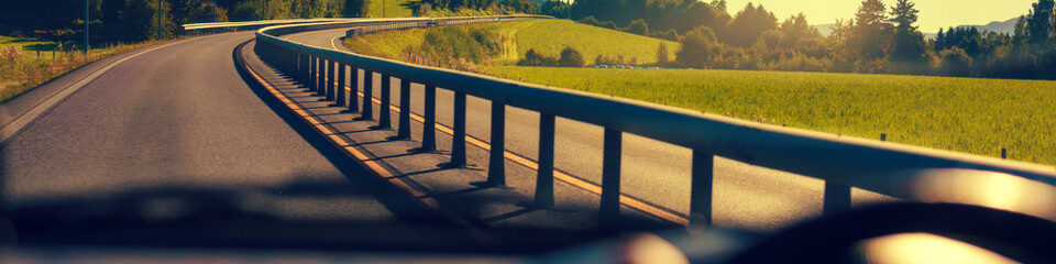 View from the windscreen. Driving a car on the road. Nature Norway