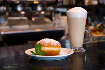 Donut with cup of coffee