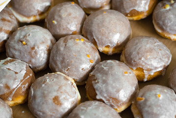 Many donuts on a glass tray