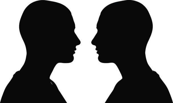 Silhouette of two human heads facing each other in profile view, symbolizing communication, confrontation, or relationship dynamics