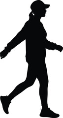 Silhouette of a woman walking in a casual outfit and cap