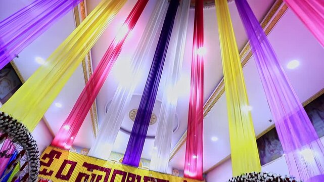 A revealing video of Sai Baba or Sai Ram idol surrounded by floral decorations inside the temple