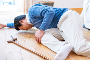 転倒した男性