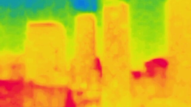The landscape of the city with skyscrapers. Image from thermal imager device.