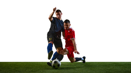 Two male soccer players contesting ball during training isolated on white background. Concept of football competition, player confrontation, match intensity, tactical play, and athletic performance. © master1305