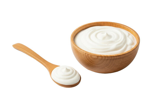 Photorealistic close-up of a rustic wooden bowl with creamy white yogurt and a wooden spoon holding a dollop, on a transparent background with copy space, clean eating concept