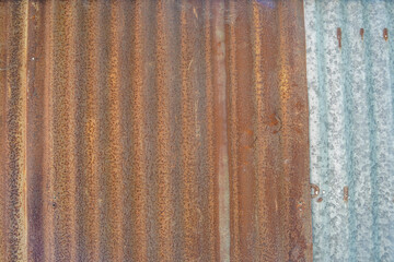 Rusted corrugated metal texture with weathered surface
