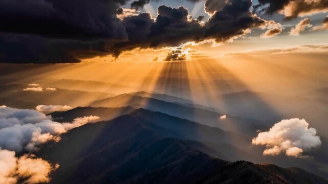 Epic aerial view of mountains with god rays and mist