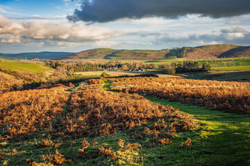 Looking over Ingram Village from Brough Law, a hill at the Breamish Valley, a scenic river valley in Northumberland, in the National Park. It&rsquo;s known for its rolling hills, at the foot of  the Cheviot