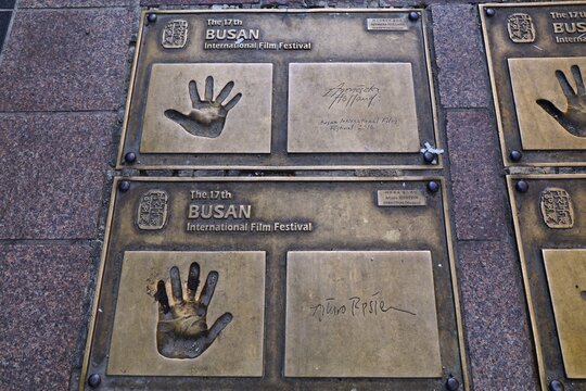 BUSAN, SOUTH KOREA - MARCH 27, 2023: Film maker hand prints of Arturo Ripstein and Agnieszka Holland commemorating Busan International Film Festival on BIFF Square in downtown Busan, South Korea.